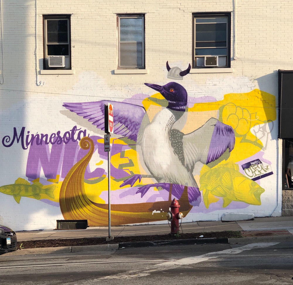 mural in Minneapolis by artist Cyfi.