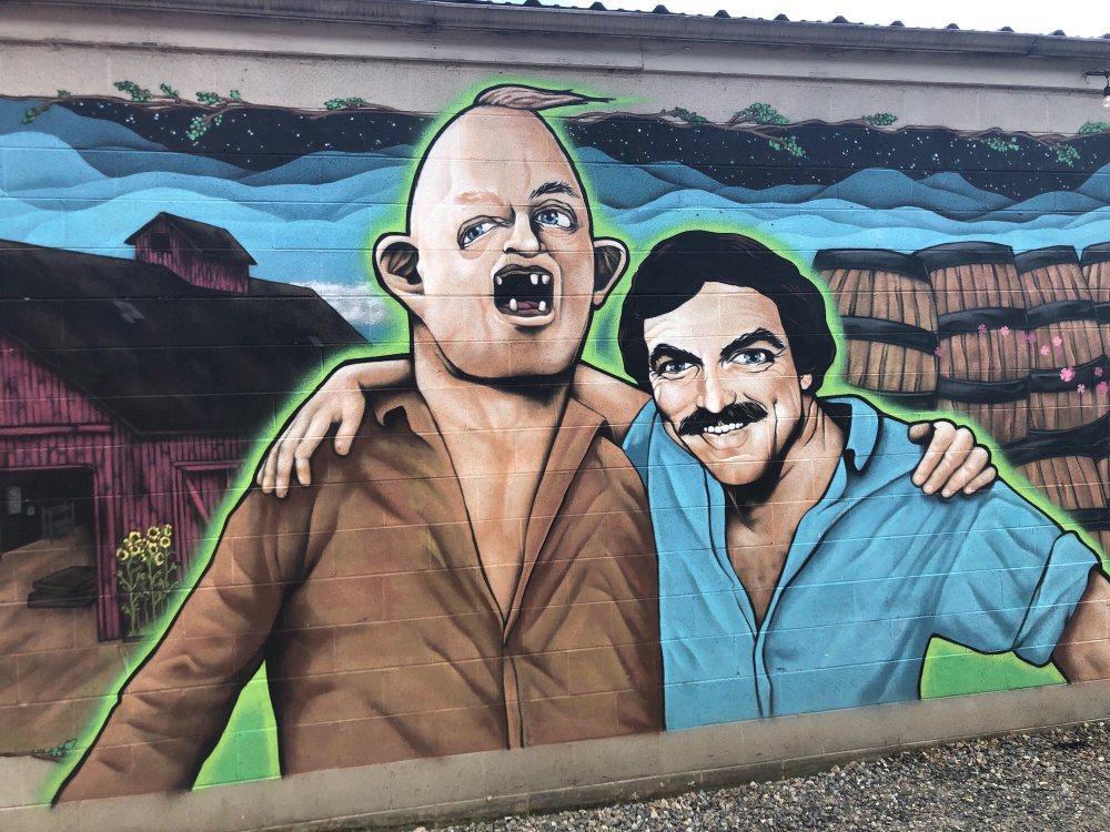 mural in Asheville by artist unknown. Tagged: Goonies, Sloth, Tom Selleck