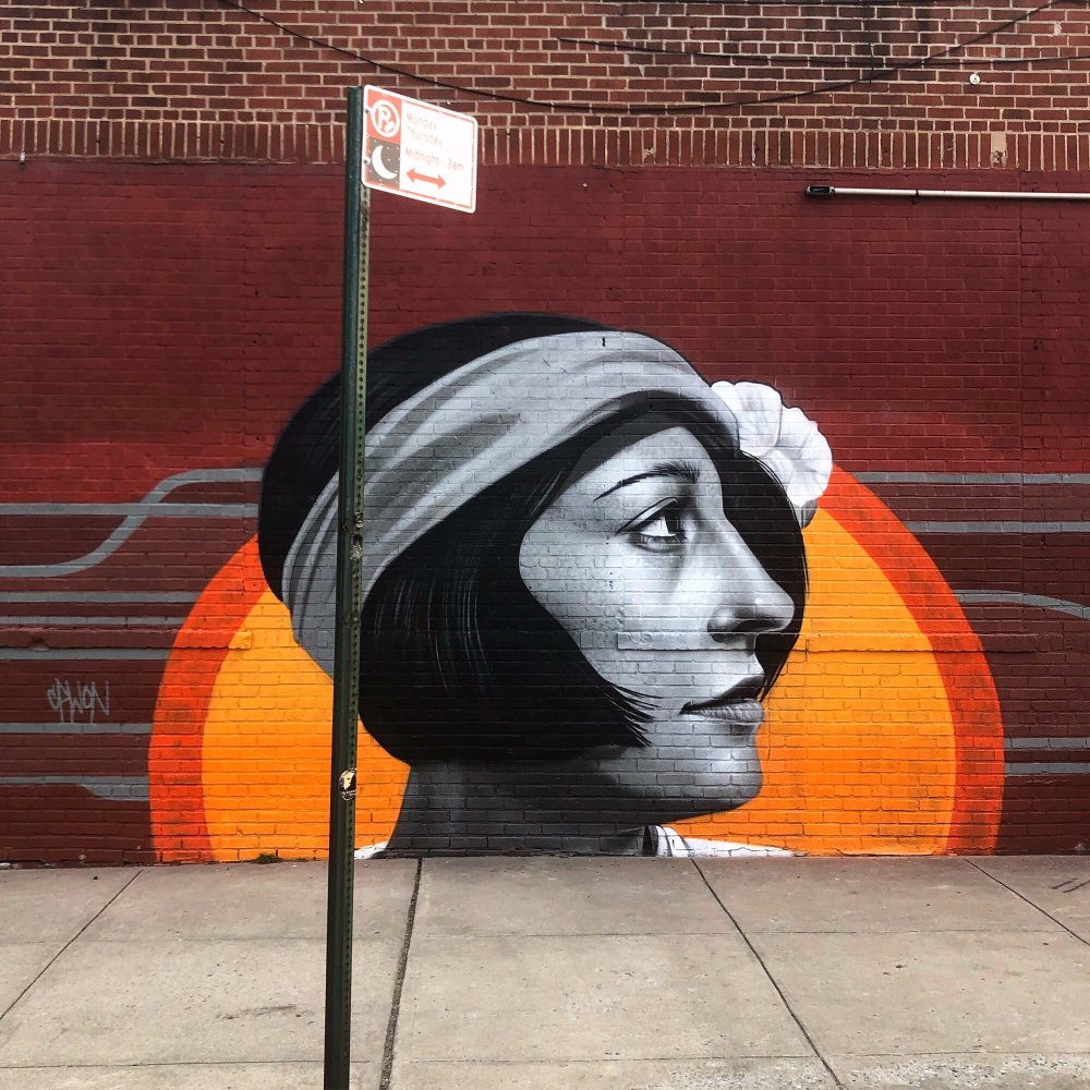 mural in Brooklyn by artist Claudio Picasso.