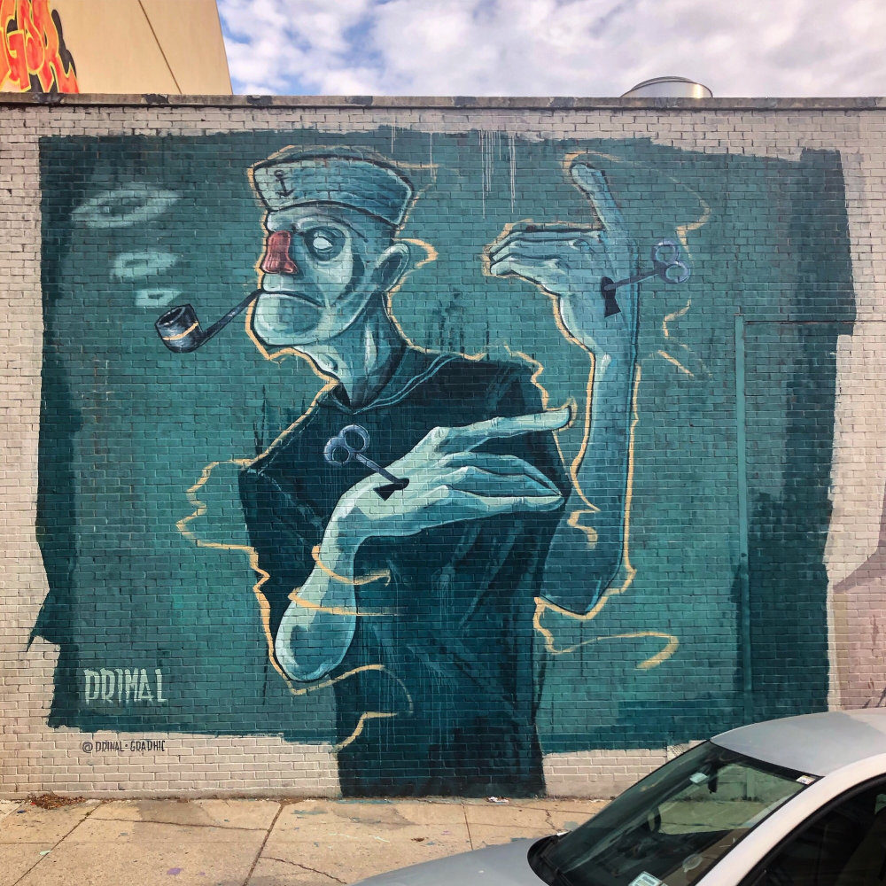 mural in Brooklyn by artist Primal Graphic.