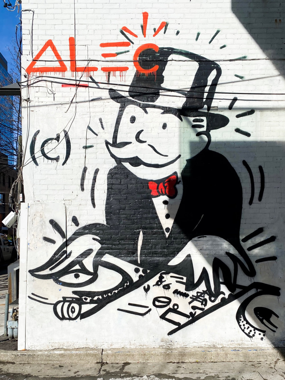 mural in Toronto by artist Alec Monopoly.