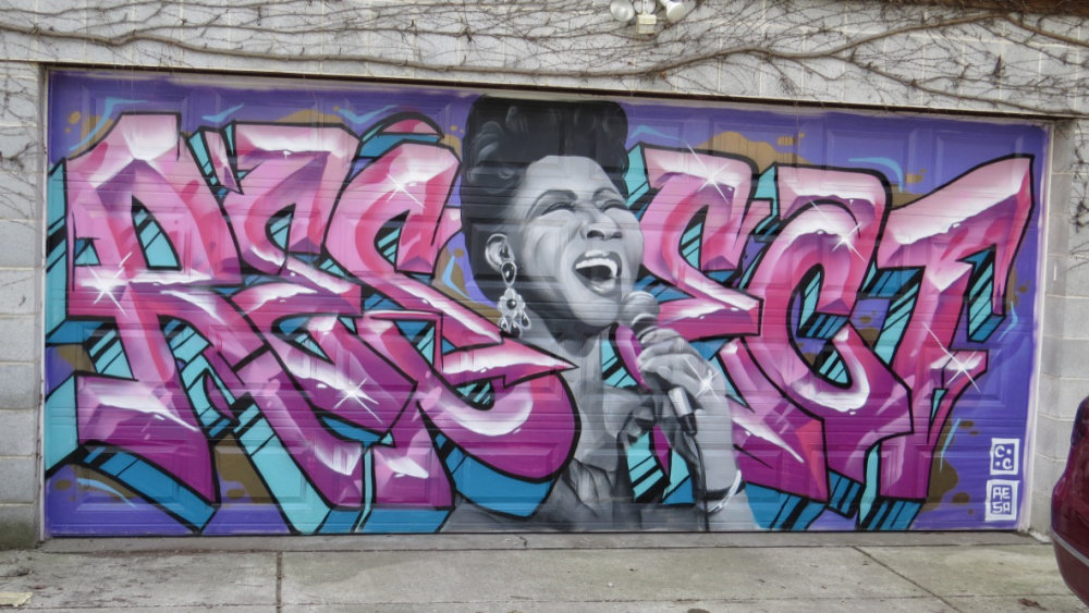 mural in Chicago by artist Menace Two Resa Piece.