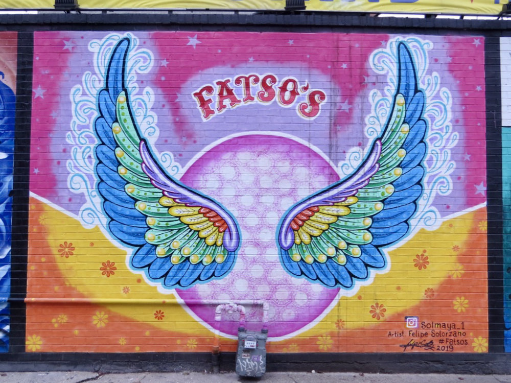 mural in Chicago by artist Felipe Solorzano. Tagged: wings