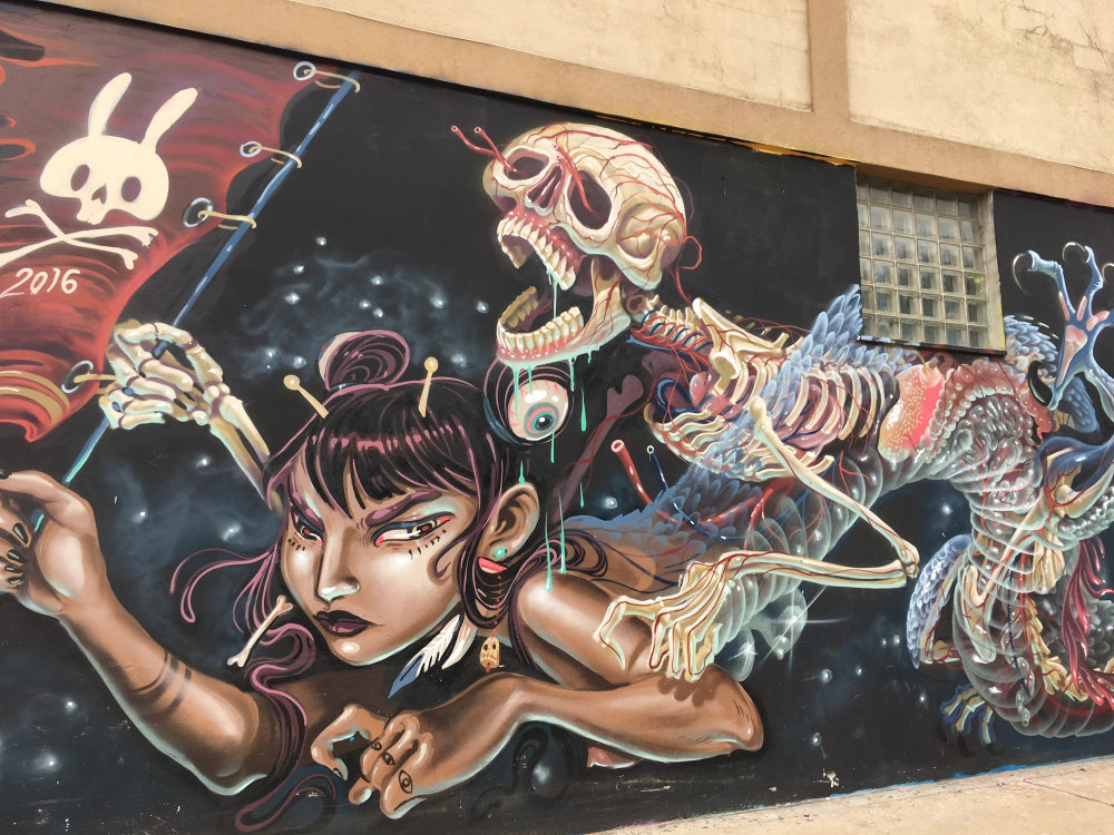 mural in Brooklyn by artist Nychos.