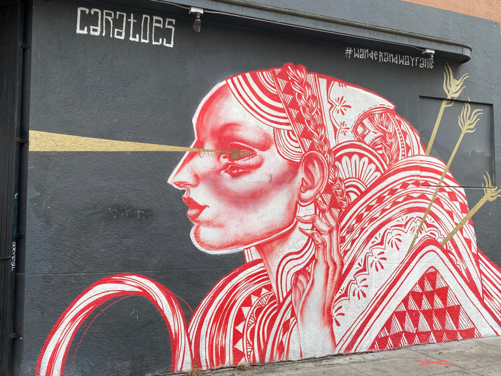 mural in San Francisco by artist Caratoes.