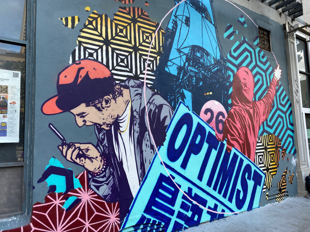 mural in San Francisco by artist Tim The Optimist.