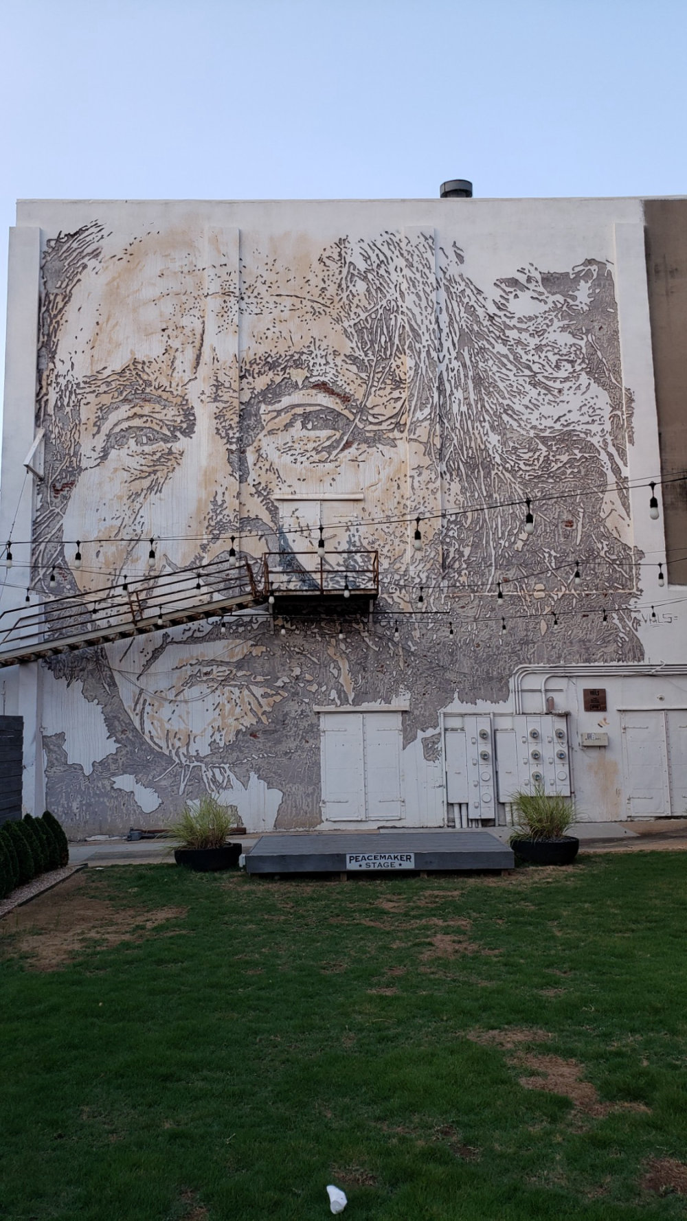 mural in Fort Smith by artist Vhils.
