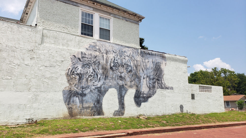 mural in Fort Smith by artist Faith XLVII.