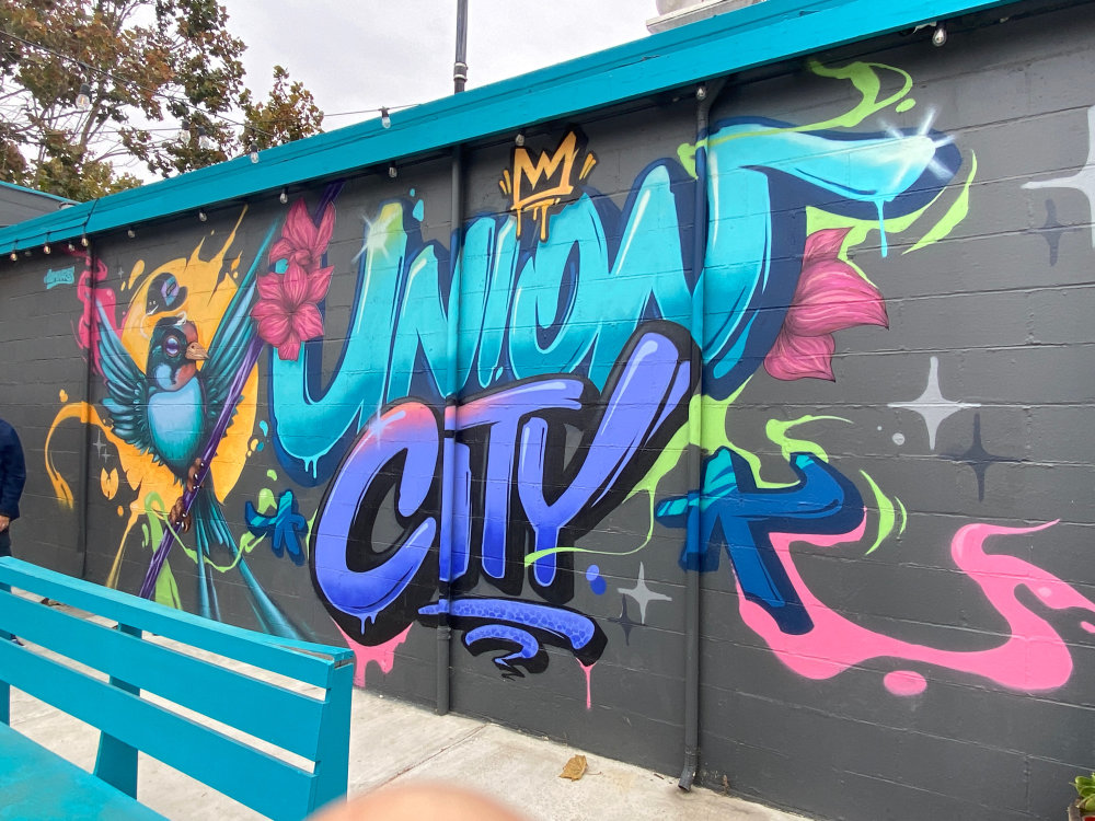 mural in Union City by artist illuminaries.