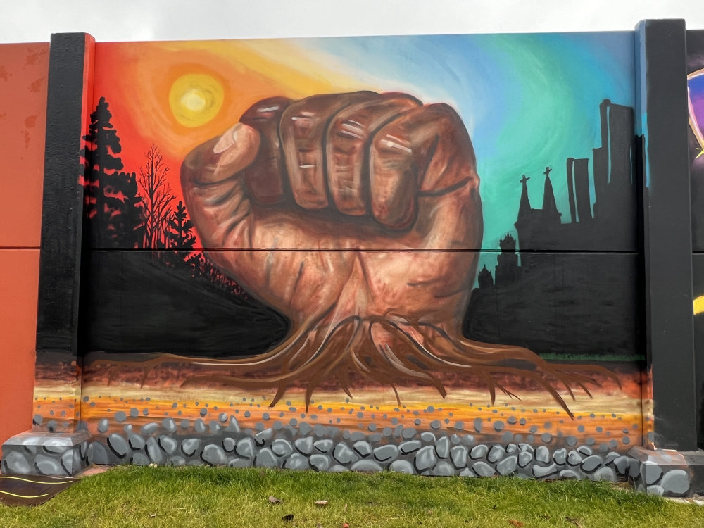 mural in Detroit by artist unknown.