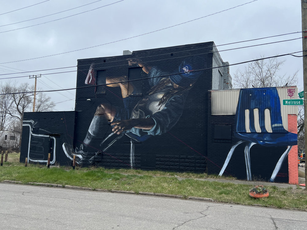 mural in Detroit by artist Bakpak Durden.