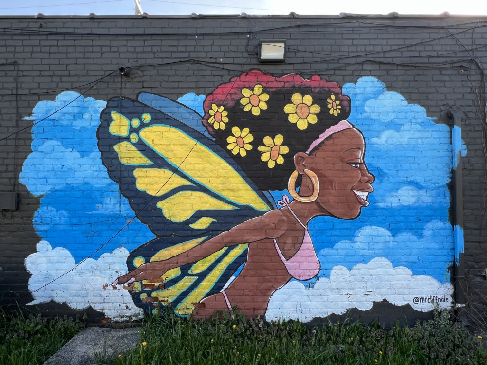mural in Detroit by artist Clifton Perry.