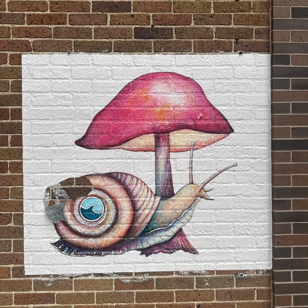 mural in Oshkosh by artist unknown.