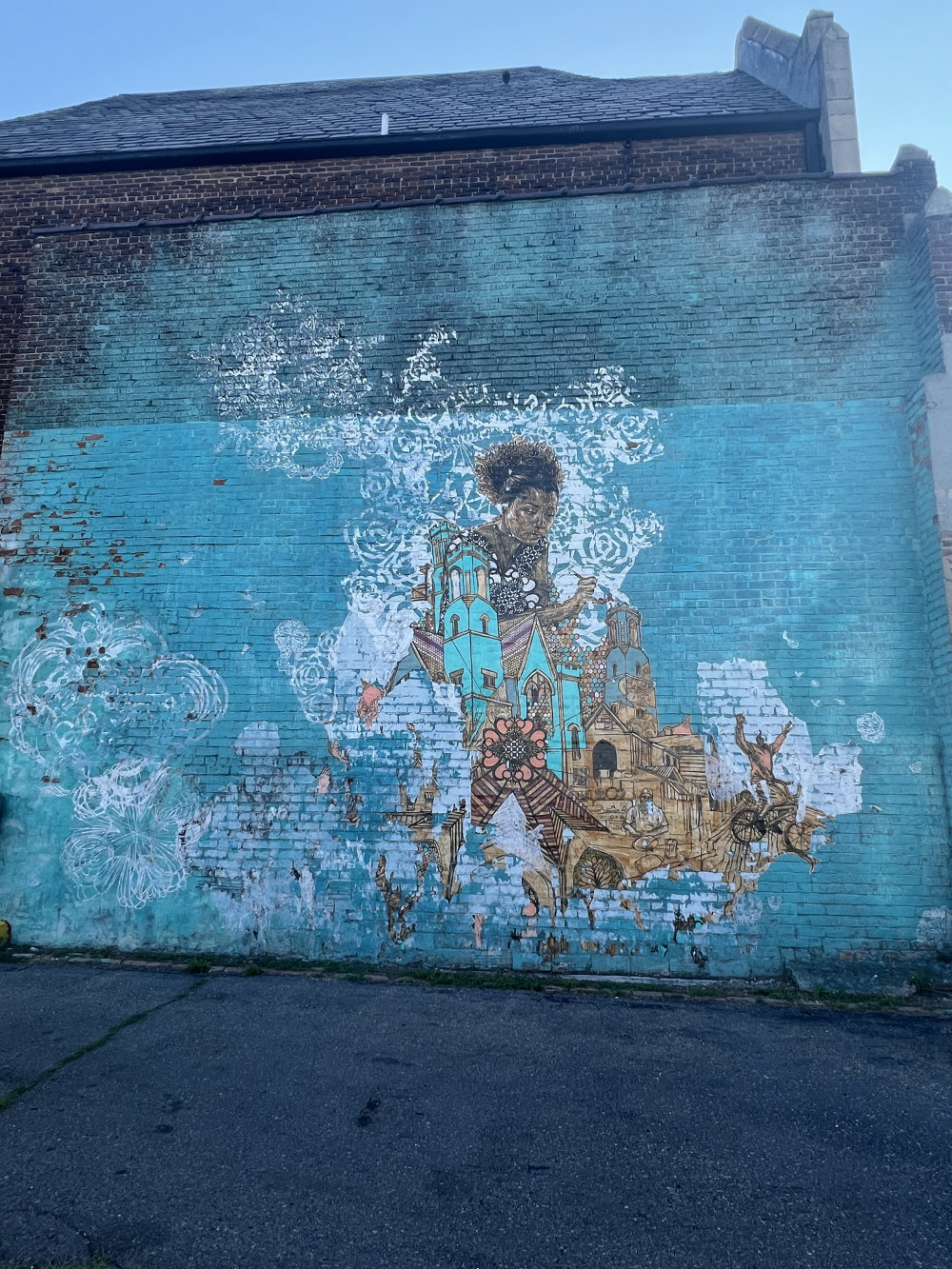 mural in Detroit by artist Swoon.