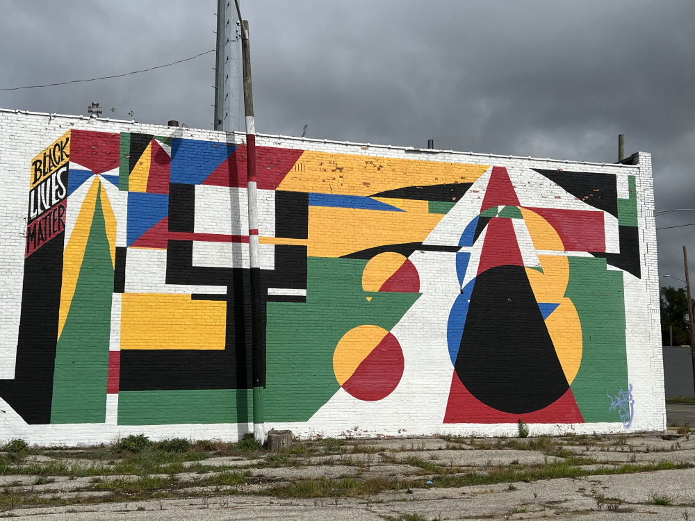 mural in Detroit by artist Victor Reyes.