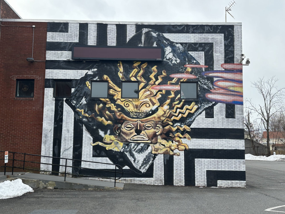 mural in Kingston by artist unknown.