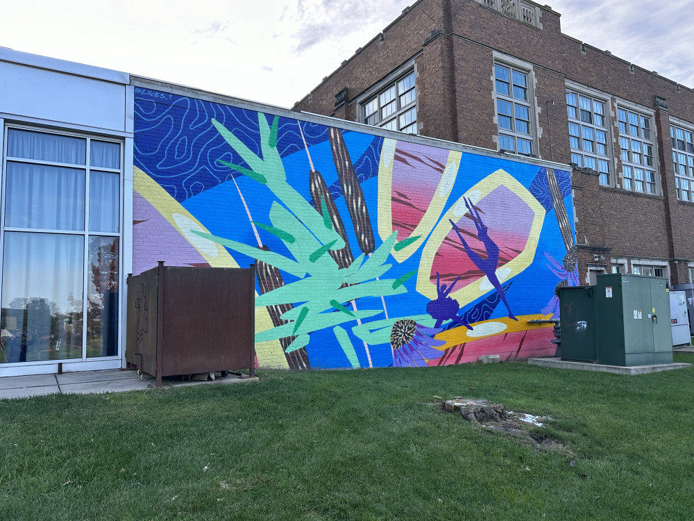 mural in Janesville by artist Rubén Aguirre.