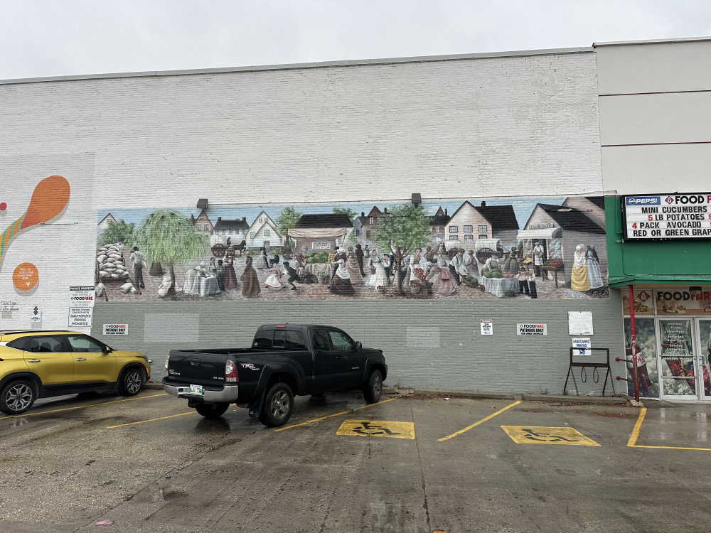 mural in Winnipeg by artist unknown.