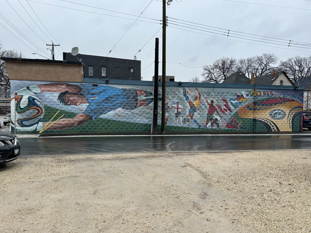 mural in Winnipeg by artist unknown.