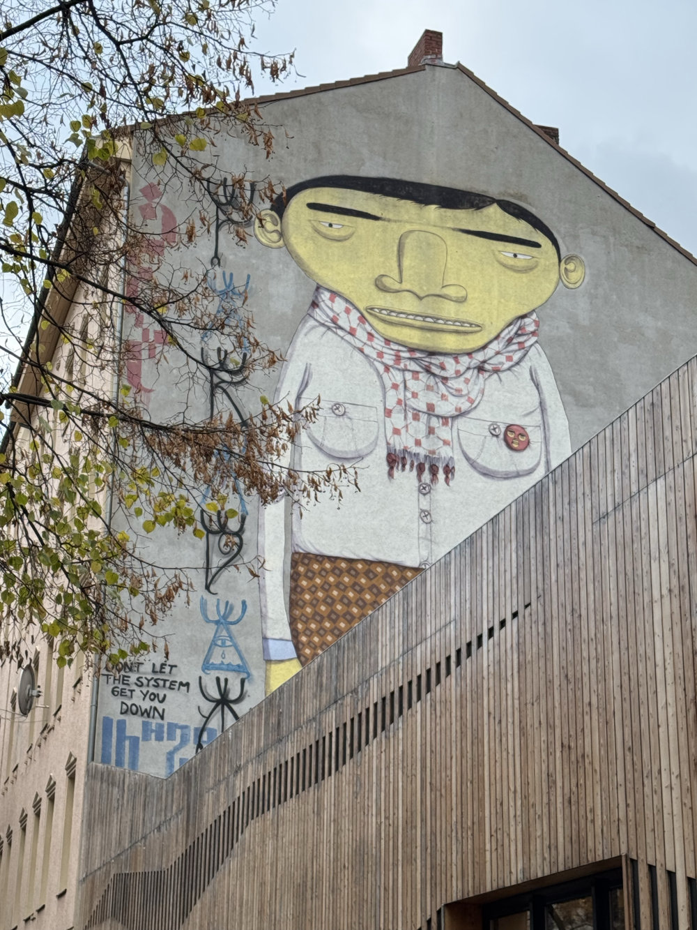 mural in Berlin by artist osgemeos.