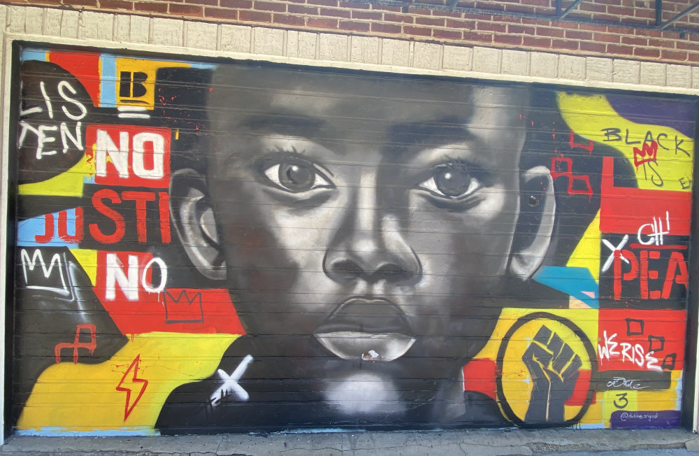 mural in Chicago by artist Dwight White II.