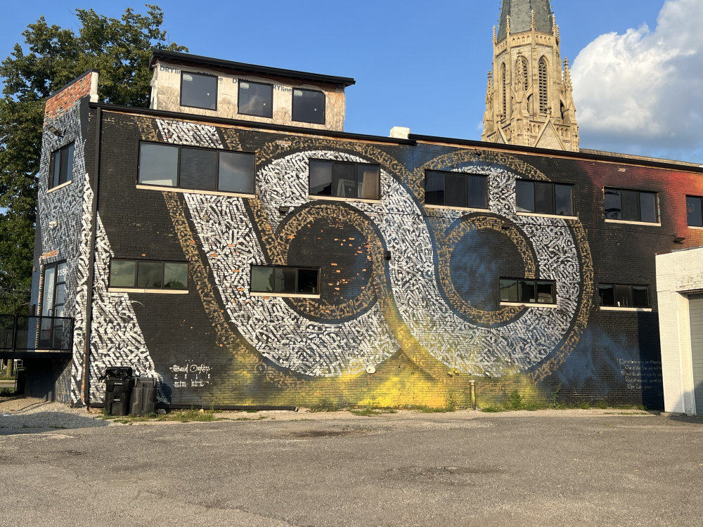 mural in Detroit by artist Said Dokins.